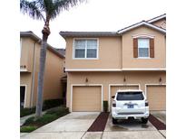 Charming two-story townhome featuring a private garage and low-maintenance landscaping at 3641 Parkridge Cir # 10-103, Sarasota, FL 34243