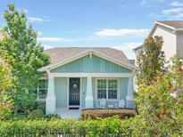 Charming single-Gathering home with a welcoming front porch and well-maintained landscaping at 6519 Watson Rd, Riverview, FL 33578