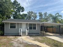 Charming one-story home featuring a covered carport and well-maintained landscaping at 6427 2Nd S Ave, St Petersburg, FL 33707