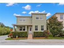 Charming two-story home with manicured landscaping and inviting curb appeal at 7333 S Trask St, Tampa, FL 33616