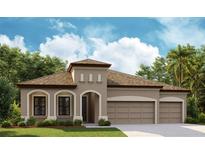 Charming single-story home featuring a neutral-colored exterior, arched windows, and a spacious two-car garage at 13048 Homestead Ln, Parrish, FL 34219