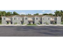 Charming townhouse with a well-maintained yard and inviting curb appeal in a desirable neighborhood at 31314 Ancient Sage Rd, Wesley Chapel, FL 33545