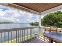 Inviting balcony with water view, perfect for relaxing and enjoying the friendly island breeze at 225 Pompano Se Dr # D, St Petersburg, FL 33705