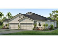 Charming single-story home featuring a two-car garage, dark roof, stone accents, and well-maintained landscaping at 31442 Paper Birch St, Wesley Chapel, FL 33545