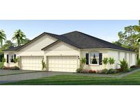 Charming single-story home featuring a two-car garage, stucco exterior, and lush landscaping at 32728 Rustic Rise Rd, San Antonio, FL 33576