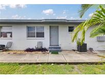 Charming single-story home with a well-maintained exterior and a small landscaped area at 1049 Apollo Beach Blvd # D, Apollo Beach, FL 33572