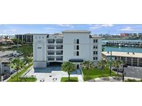 Modern condo building with waterfront views and parking at 211 Dolphin Pt # 501, Clearwater, FL 33767