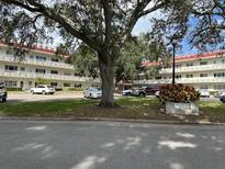 Loch Lomond condominium building with ample parking at 2362 Jamaican St # 64, Clearwater, FL 33763