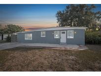 Newly renovated home with a grey exterior at 4012 W Montgomery Ter, Tampa, FL 33616