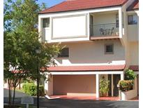 Two-story condo building with attached garage at 240 Windward Psge # 504, Clearwater, FL 33767