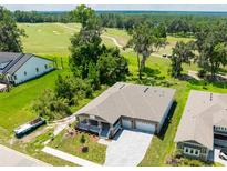Single-Gathering home with golf course views and a two car garage at 6436 Summit View Dr, Brooksville, FL 34601