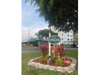 Lexington building entrance with landscaped area at 5970 80Th N St # 308, St Petersburg, FL 33709