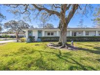 Ranch style home with mature oak tree in front at 11200 102Nd Ave # 51, Seminole, FL 33778
