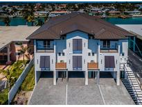 Modern three-unit building with private parking and waterfront views at 12305 3Rd E St # 3, Treasure Island, FL 33706