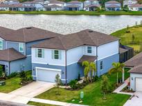 Two-story house near lake, two-car garage at 9509 Lamine Way, Parrish, FL 34219