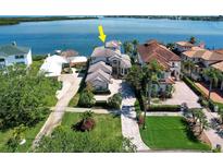 An aerial view of the beautiful waterfront home showcasing its proximity to the bay at 6627 Bayou Grande Ne Blvd, St Petersburg, FL 33702