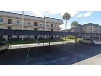 Two-story apartment building with covered parking at 8693 Bardmoor Blvd # 207B, Seminole, FL 33777