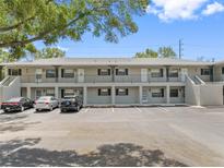 Front view of a two-story building with parking at 101 Lake Ne Ave # 225, Largo, FL 33771