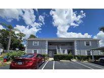 Two-story building with parking and landscaping at 12125 Spartan Way # 201, Hudson, FL 34667