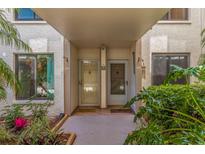 Inviting condo entrance featuring well-maintained landscaping and a cozy, private entryway at 6365 Bahia Del Mar Blvd # 105, St Petersburg, FL 33715