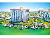 Luxury waterfront community with boat docks and a swimming pool at 736 Island Way # 404, Clearwater Beach, FL 33767