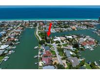 House with canal access and beach proximity at 309 Belle Isle Ave, Belleair Beach, FL 33786