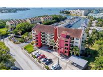 Aerial view of condo building near marina at 1750 Harbor S Pl # 103, South Pasadena, FL 33707