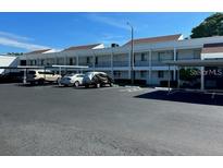 Multi-unit building with covered parking spaces at 2060 Marilyn St # 124, Clearwater, FL 33765