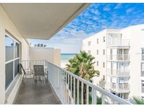 Ocean view balcony with patio furniture at 19610 Gulf Blvd # 409, Indian Shores, FL 33785