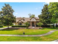 Beautiful two-story home with manicured landscaping and a large front yard at 1570 Preserve Way, Clearwater, FL 33764