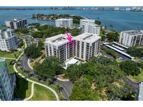 A premium waterfront condo complex with lush landscaping and stunning views of the Sarasota Bay area at 150 Belleview Blvd # 704, Belleair, FL 33756