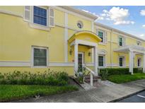 Inviting yellow building exterior with manicured landscaping at 4924 Beach Se Dr # C, St Petersburg, FL 33705