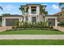 Two-story home with modern architecture and lush landscaping at 1254 Cordova Ne Blvd, St Petersburg, FL 33704