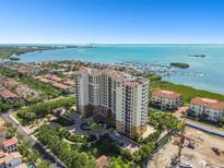 Luxury waterfront condo building with marina, offering stunning bay views at 5823 Bowen Daniel Dr # 905, Tampa, FL 33616