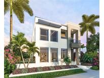 Modern two-story home with sleek design and landscaping at 5701 Bowen Daniel Dr. # 1 Villa, Tampa, FL 33616