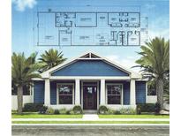 Two-story home with blue exterior, white columns, and front porch at 241 5Th N Ave, Safety Harbor, FL 34695