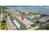 Stunning aerial view of condo community near the beach with water views and convenient parking at 3128 59Th S St # 214, Gulfport, FL 33707