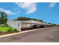 Covered parking area with ample spaces for residents at 1655 S Highland Ave # B216, Clearwater, FL 33756