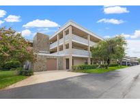 Building exterior of condo with parking at 5080 Locust Ne St # 329, St Petersburg, FL 33703