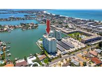 Aerial view of a condo building near the water at 420 64Th Ave # A, St Pete Beach, FL 33706