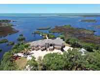 Waterfront mansion with expansive grounds at 1227 Osowaw Blvd, Spring Hill, FL 34607