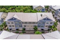 Aerial view of townhouses with water access at 6042 Anchorage S Way, St Petersburg, FL 33712