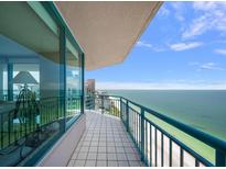 Enjoy stunning Gulf views from this balcony with tiled flooring and glass windows for seamless indoor-outdoor living at 1540 Gulf Blvd # 2102, Clearwater Beach, FL 33767