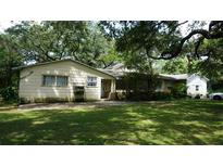 Ranch style home with mature trees and lawn at 8230 74Th N St, Pinellas Park, FL 33781