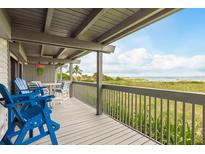 Spacious deck with ocean view and outdoor seating at 200 120Th W Ave # 3A, St Petersburg, FL 33706