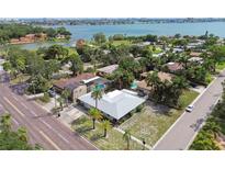 Single-Gathering home with a large yard, near the water at 7979 Garden N Dr, St Petersburg, FL 33710