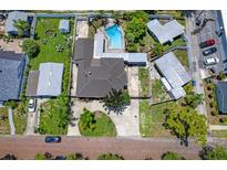 Aerial view of home, pool, and surrounding neighborhood at 4822 3Rd S Ave, St Petersburg, FL 33711