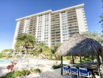 High-rise building with pool and patio area at 400 Island Way # 308, Clearwater, FL 33767