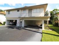 Two-story building with private parking and balconies at 1829 Bough Ave # 4, Clearwater, FL 33760
