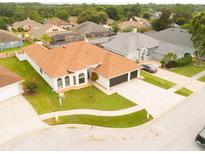 Single-Gathering home with a three-car garage and pool at 4154 Sinclair Pl, Land O Lakes, FL 34639